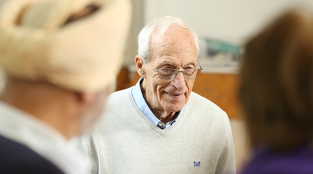 Photo of a stroke survivor at a stroke group meeting