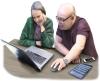 Illustration of two people looking at a laptop